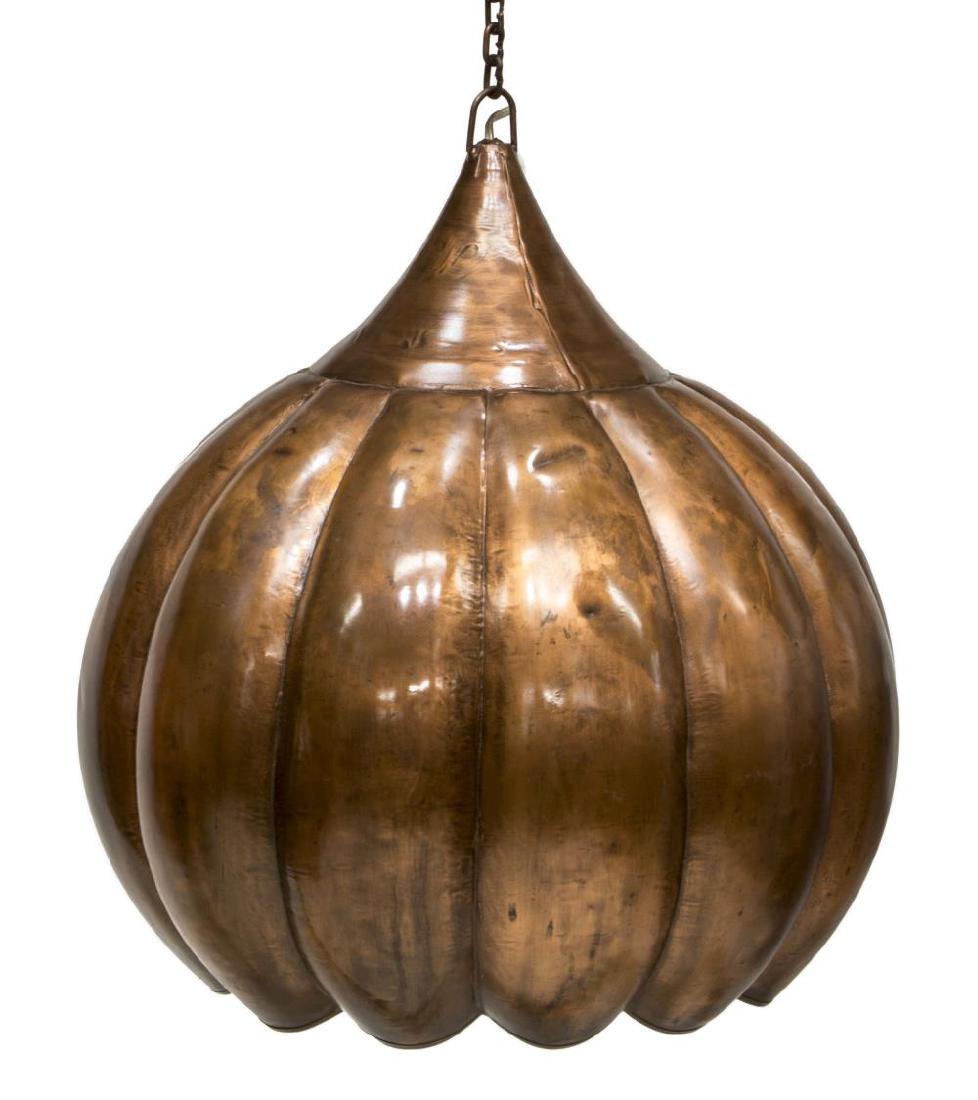 FOLIATE FORM COPPER SINGLE LIGHT CHANDELIER: Floriform single-light copper pendant chandelier, having ceiling cap and chain, closed petals accents with brown paint, hammered marks at top, from top ring: 21"h, 18.5"diam Start Price: $100.00