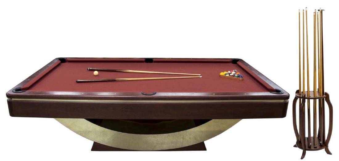 MITCHELL CUSTOM MODERN TOURNAMENT POOL TABLE: Mitchell custom 'Marco' tournament size pool table, with mahogany frame, burgundy billiard cloth, sculptural polished brass base, accompanied by floor cue stand with cue sticks and bridge, box of Aram