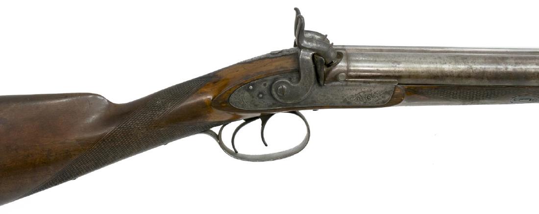TIPPING & LAWDEN, LONDON, PERCUSSION SHOTGUN: Tipping & Lawden, London, 12 gauge muzzle load percussion double 30" Damascus barrel shotgun, 1870's, engraved hounds head at rear of barrels with two inset gold bands, two engraved hammers, the lockp