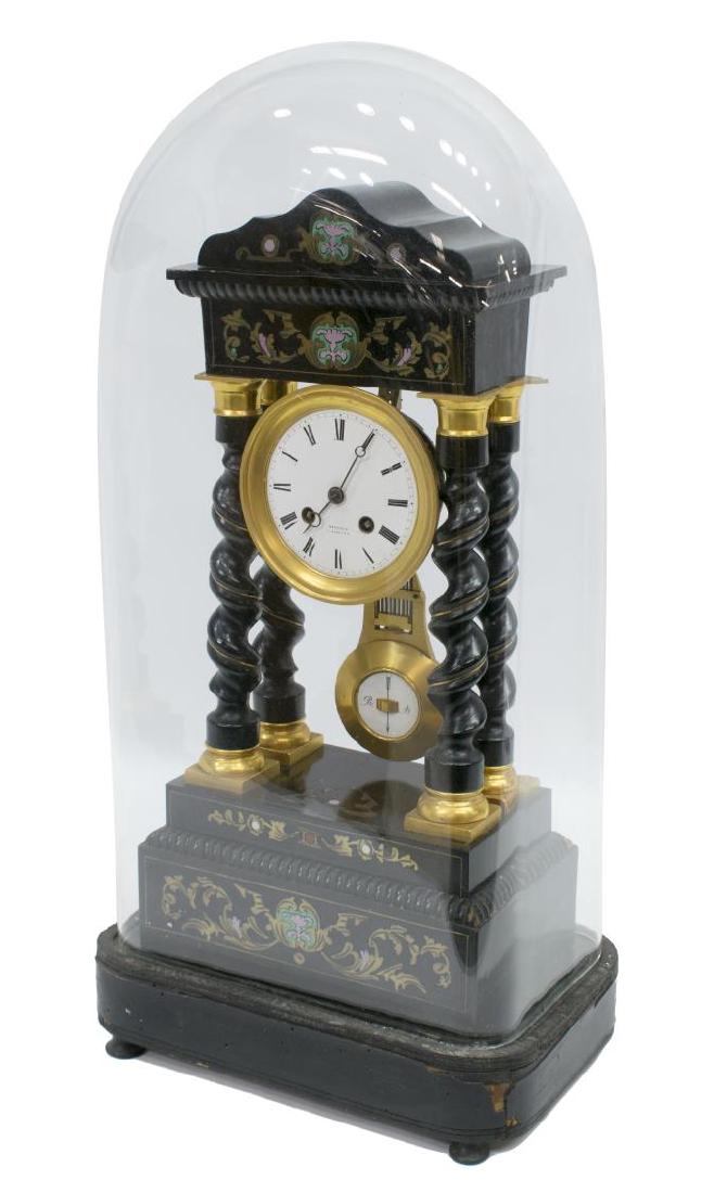 NAPOLEON III PERIOD PORTICO CLOCK WITH GLASS DOME: Napoleon III period portico clock, France, c. 1870, having ebonized walnut case, with contrasting marquetry, barley twist supports, with gilt metal caps, circular white enamel face, with black roman n