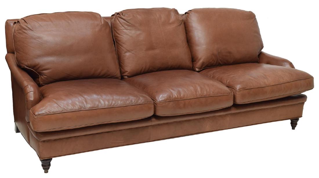 CONTEMPORARY BROWN GRAINED LEATHER 3-SEAT SOFA: Contemporary three-seat sofa, upholstered in brown grained leather, with removable back and seat cushions, rolled arms with button detailing, rising on short turned wood legs, some marks to leather, a