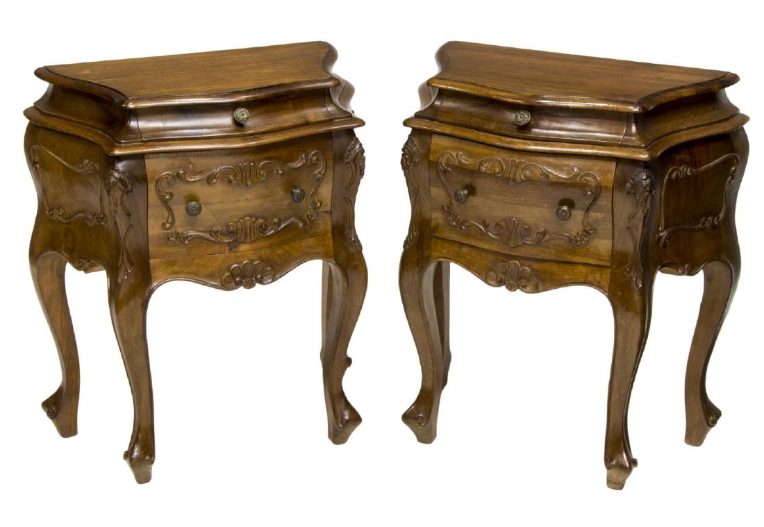 (PAIR) ITALIAN ROCOCO STYLE BEDSIDE CABINETS: (pair) Italian Rococo style bedside cabinets, 20th c., shaped top, over case fitted with two drawers, scrolling foliate designs, rising on cabriole legs, ending in whorl feet, approx 26"h, 22.25"w, 12