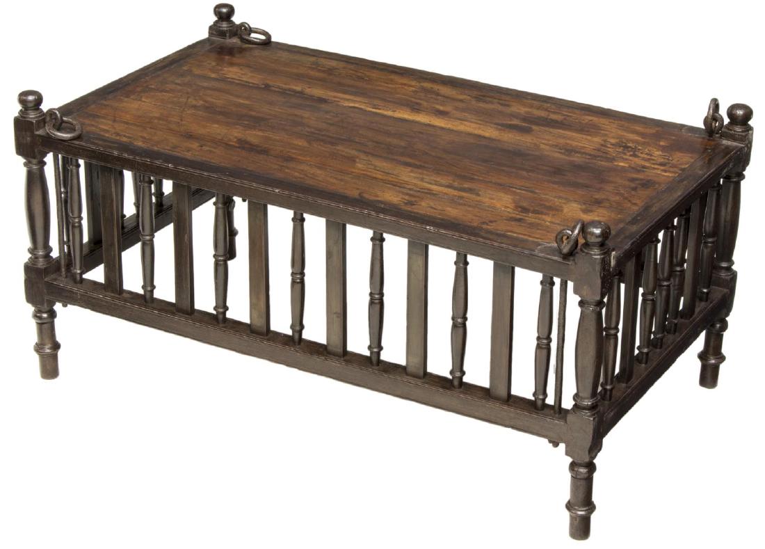DIMINUTIVE ROSEWOOD COFFEE/SOFA TABLE, IRON LOOPS: Diminutive rosewood sofa table, having mushroom cap finials, over rectangular surface, with iron loops to corners, over turned-and-slat open sides, rising on turned legs, approx 18"h, 36"w, 21.25"d St