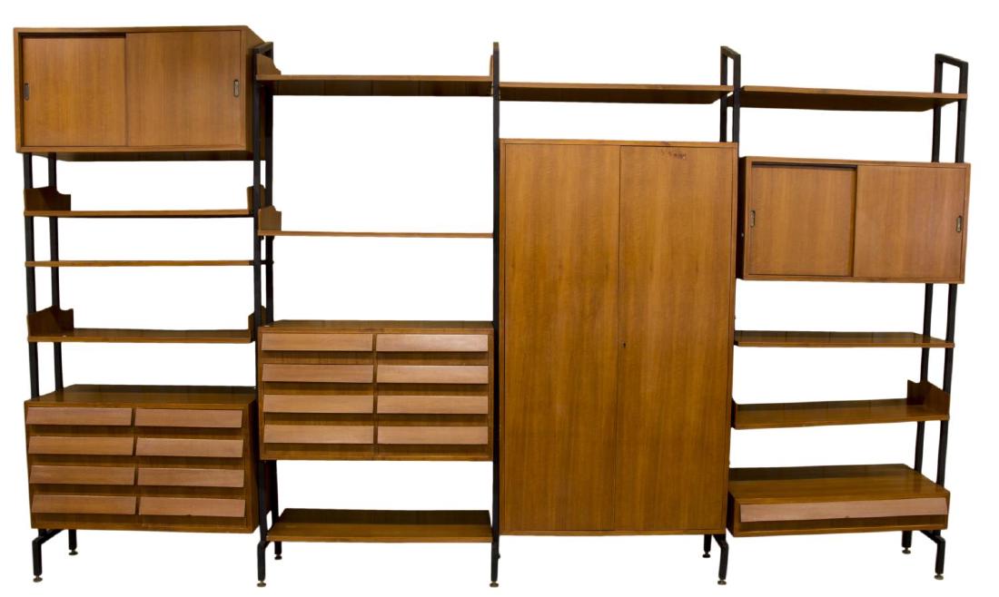 ITALIAN MID-CENTURY MODERN MODULAR WALL UNIT: Italian mid-century modern modular wall unit, c. 1960, having vertical metal supports, with open shelves, two stacks of eight drawers each, two sliding door cabinets, single double-door cabinet and fu