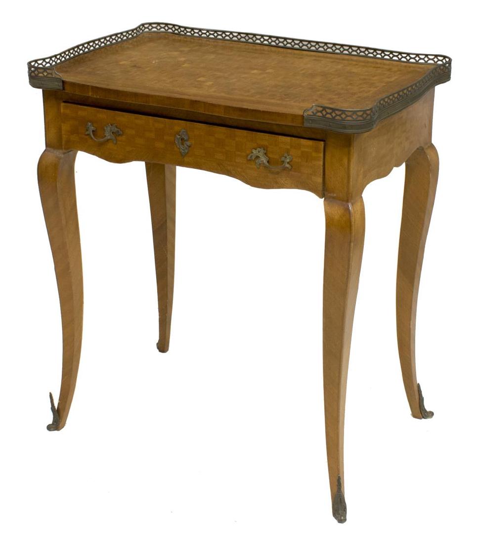 FRENCH PARQUETRY SIDE TABLE: French side table, early 20th c., the parquetry rectangular top with shaped pierced rail at three sides above a single frieze drawers, rising on cabriole legs, 33.25"h, 49.5"w, 19"d Start Price: $100.