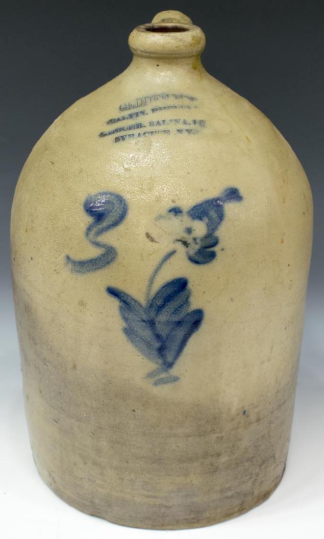GEDDES, NEW YORK 3-GALLON STONEWARE JUG, C. 1860: Three-gallon stoneware jug, Geddes, New York, c. 1860, narrow lip and neck, incised "Geddes N.Y., Calvin Pierson, Grocer. Salina. St. Syracuse NY" on shoulder, floral design to front, approx 14.75"h, 