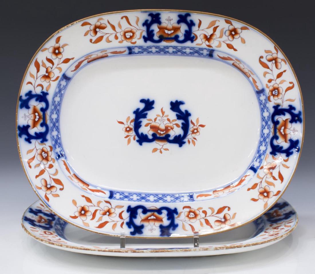 (2) ANTIQUE STAFFORDSHIRE EARTHENWARE IMARI TRAYS: (pair) Large Staffordshire earthenware service trays, Minton, BB New Stone (impressed), 19thc., each of graduated size, decorated in the Imari palette in oranges and cobalt blue (flowing through to ve