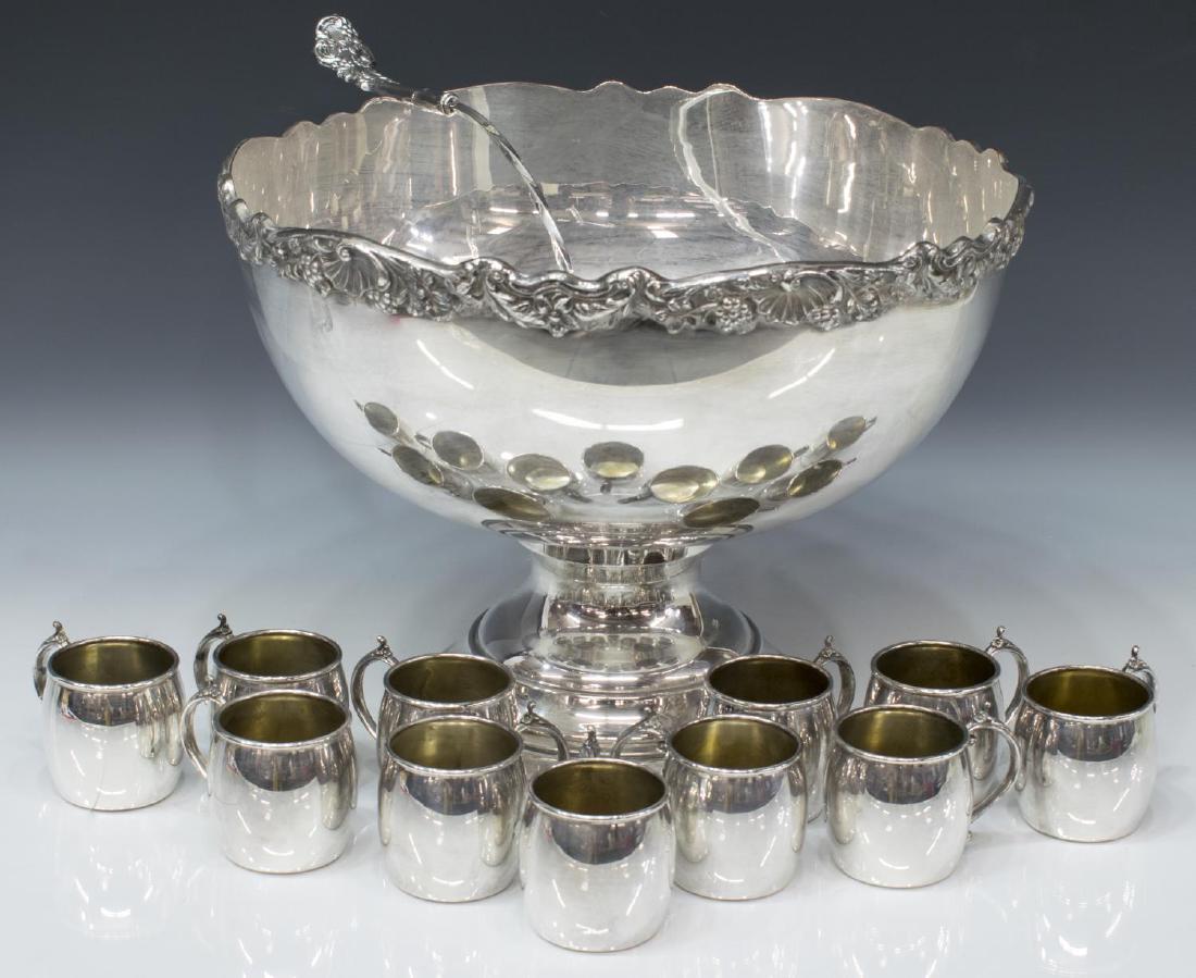 (13) LARGE FB ROGERS SILVERPLATE PUNCH SERVICE: (set of 13) FB Rogers silver plate pedestal punch bowl, the rim showing scrolled rocaille, floral and berry vines, accompanied by (11) matched cups and (1) matched ladle, punch bowl: 11"h, 15"diam, 10