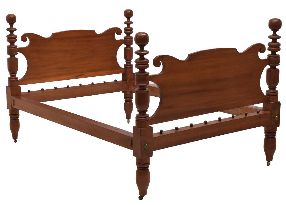 AMERICAN CANNONBALL FOUR POSTER ROPE BED: American cannonball four poster rope bed, 19th c., scrolled head and footboards, turned posts at each corner with ball finial, rising on tapered legs ending in casters, exterior: approx 45.25"h, 52.5"