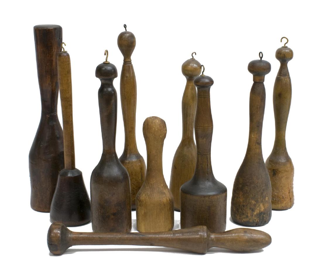 (10) GROUP OF AMERICAN PRIMITIVE TREENWARE PESTLES: (lot of 10) American primitive turned wood pestles/muddlers, 19th/20th c., some with metal hooks to top, 13"l; 6lbs total **Provenance: Estate of Mrs. E.M. (Mary) Drew (1923-2015), Drew's Antiques & P