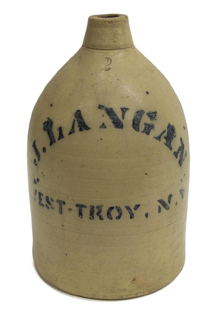 2 GALLON STONEWARE JUG, J. LANGAN WEST TROY NY: 2 gallon glazed stoneware jug, narrow mouth, applied handle, stamped 2 to front, above cobalt blue slip stenciled J. Langan West Troy, N.Y., possibly an advertisement, light incised lines around body,
