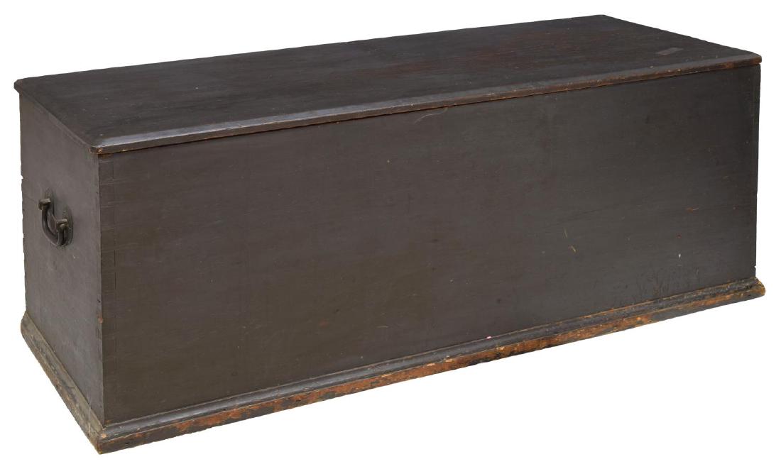 AMERICAN PRIMITIVE PINE WOOD EBONIZED FINISH CHEST: American Primitive pine wood blanket chest, 19th c., having ebonized finish, and dovetail joints, rectangular top, bat's wing iron pulls to side, rope lid catch to interior (replaced), approx 24.25"h,