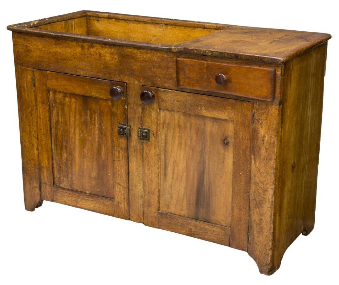 AMERICAN PRIMITIVE DRY SINK CABINET: American dry sink, 19th c., shallow basin top with work surface, lower case fitted with drawer over double-door cabinet, opening to shelves, rising on bracket feet, approx 33.75"h, 49"w, 21.5"d **Prov