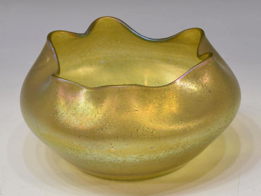 LOETZ (ATTRIB) YELLOW IRIDESCENT ART GLASS BOWL: Yellow iridescent art glass bowl, possibly Loetz, unmarked, having undulating edge, ground and polished pontil, 3.75"h, 6.5"diam, 3lbs **Provenance: Estate of Mrs. E.M. (Mary) Drew (1923-2015), Drew's