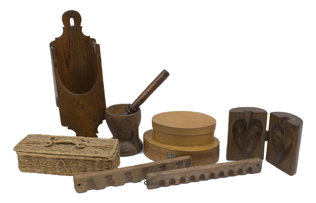 AMERICAN TREEN PANTRY BOXES, MOLDS, MORTAR PESTLE: (lot of 9) American primitive treenware and bentwood group, including (1) mortar and (1) pestle, (1) closing heart box/ mold, (2) slim hanging wood molds, (1) hanging candle? box, (1) oval pantry box,