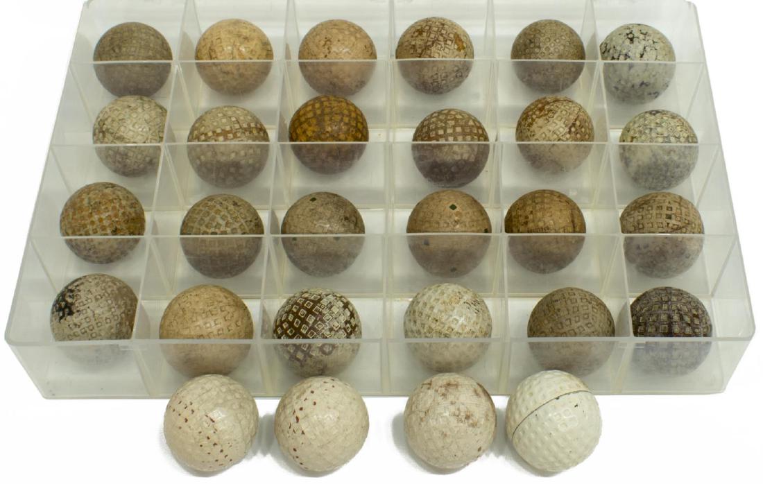 (28) MESH COVER GOLF BALLS, PRACTICE BALLS, DUNLOP: (lot of 28) Mesh cover golf balls, highlights include: (4) practice balls, (one) with case; (3) Spalding Kro-Flite balls; (5) Dunlop English balls: (1) Colonel Practice ball; (1) Reach ball; 2.75lbs t