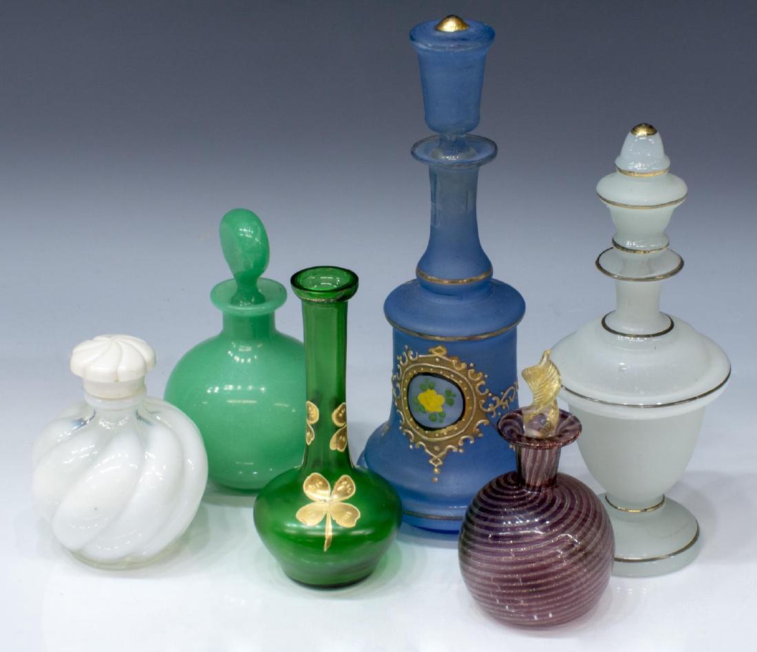 (6) COLLECTION OF GLASS PERFUME SCENT BOTTLES: (lot of 6) Glass perfume scent bottles, highlights include: (1) Murano art glass bottle, bulbous form in an amethyst and gilt swirl pattern, approx 4.75"h, 2.25"diam, (1) opaline green glass bottle, a