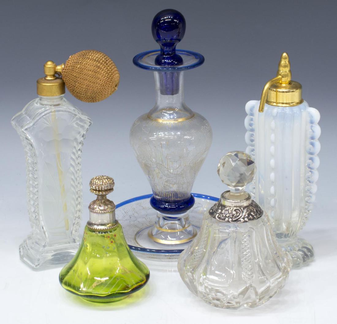 (5) COLLECTION OF GLASS PERFUME SCENT BOTTLES: (lot of 5) Glass perfume scent bottles, highlights include: (1) opaline glass bottle, with gilt metal atomizer top, approx 6.75"h, 2.5"diam, (1) English glass bottle, 1905, with sterling silver collar
