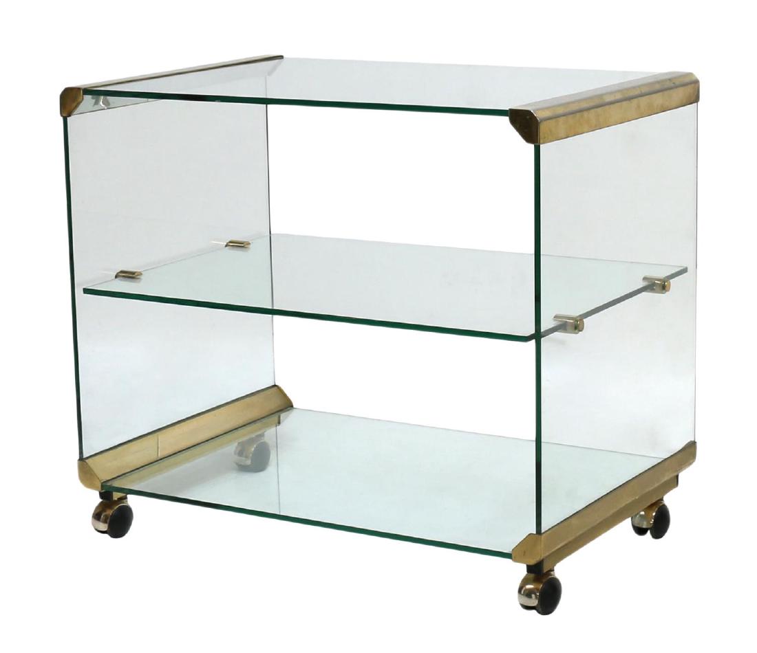 FRENCH MODERN GILT METAL & GLASS TIERED CART: French modern gilt metal and glass service cart, in the manner of Maison Jensen, three tiers moving on ball form castors, approx 24"h, 27"w, 17.75"d Start Price: $150.00