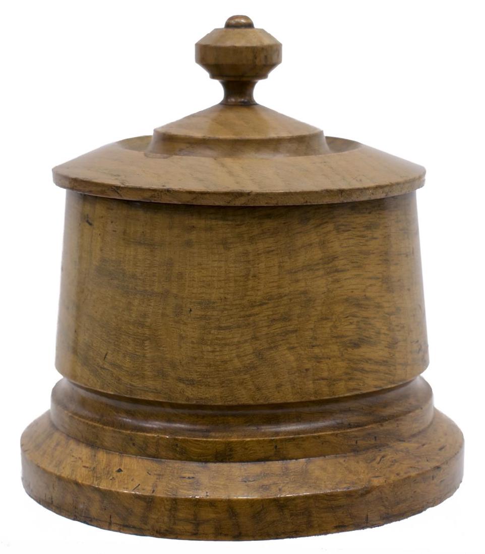 ENGLISH TURNED POLLARD OAK TOBACCO BOX, C. 1900: English turned pollard oak tobacco box, c. 1900, stepped circular form, with removable lead inner lining, lid with turned finial, approx 6.5"h, 6"diam, 3.25lbs Start Price: 50.00