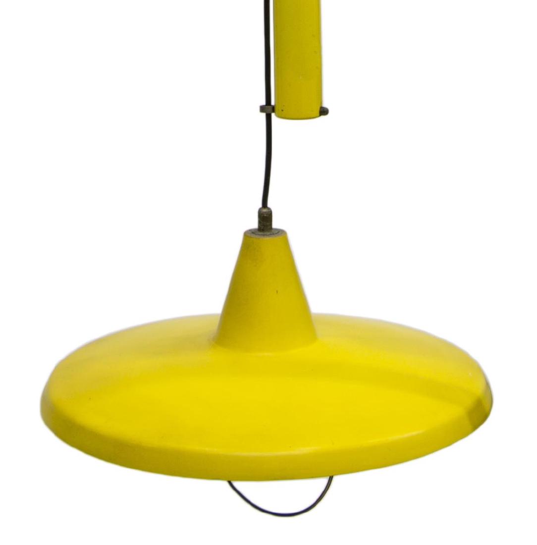 ITALIAN MODERN ENAMELED 1LT CEILING LAMP: Italian mid-century modern industrial ceiling lamp, c. 1960's, having adjustable height, controlled via pulleys, yellow enameled metal shade, over single fixture, in need of wiring, approx 45"h, 15"di