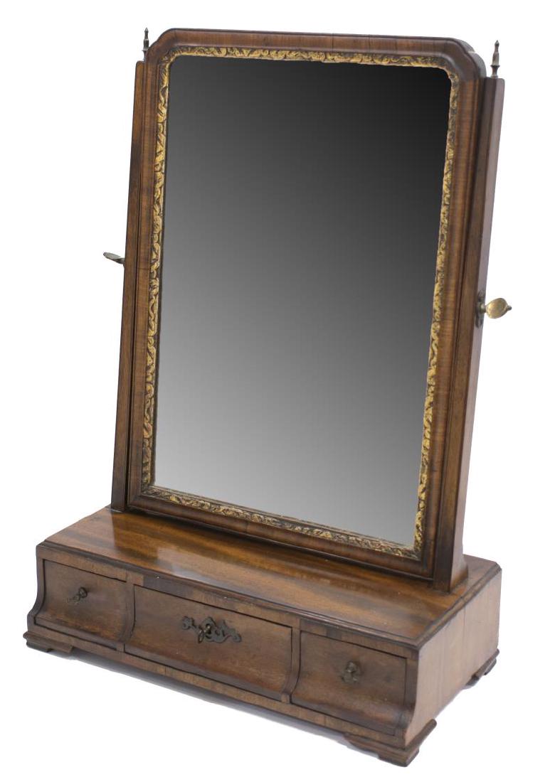 ENGLISH GEORGIAN MAHOGANY DRESSER MIRROR STAND: English Georgian mahogany dresser mirror, early 19th c., cheval mirror with gilt border, on tapered supports surmounted by small finials, over stand fitted with three drawers, rising on bracket feet, 