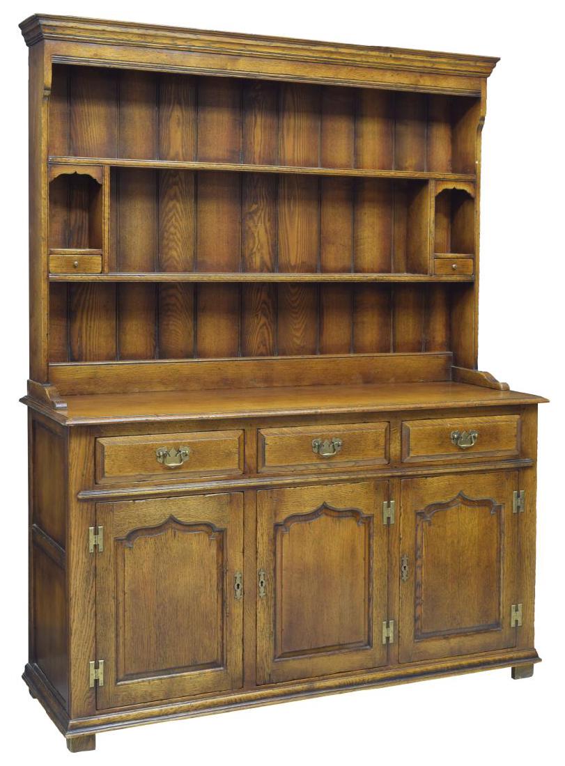 18THC. STYLE ENGLISH OAK KITCHEN DRESSER/SIDEBOARD: English oak kitchen dresser/sideboard, in the 18th century style, a corniced top, over open shelves and drawers, above rectangular work surface, case fitted with three drawers and three cabinet doors,