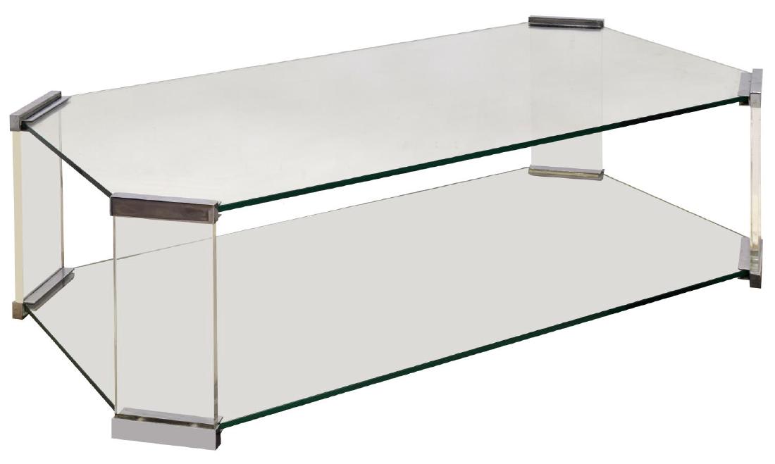 ITALIAN MODERN CHROME & GLASS SOFA TABLE: Italian modern sofa table, having rectangular clear glass top, with chrome brackets to corners, on plexiglass supports, joined by lower clear glass shelf, approx 14"h, 48.25"w, 27"d Start Price: 200.0