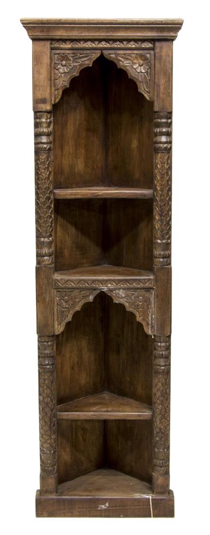 ANGLO-INDIAN CORNER SHELF STORAGE CUPBOARD: Anglo-Indian corner shelf, with stepped cornice top, over four shelves, two with carved floral alcove brackets, sides with carved foliate pilasters, rising on plinth base, approx 71"h, 22"w, 12.75"d S