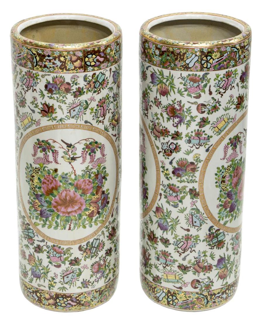 (2) CHINESE ROSE MEDALLION UMBRELLA STANDS: (lot of 2) Chinese rose medallion porcelain umbrella stands, with circular reserves of birds and floral branches, parcel gilt borders, approx 23.5"h, 9"diam, 24lbs total Start Price: $100.00