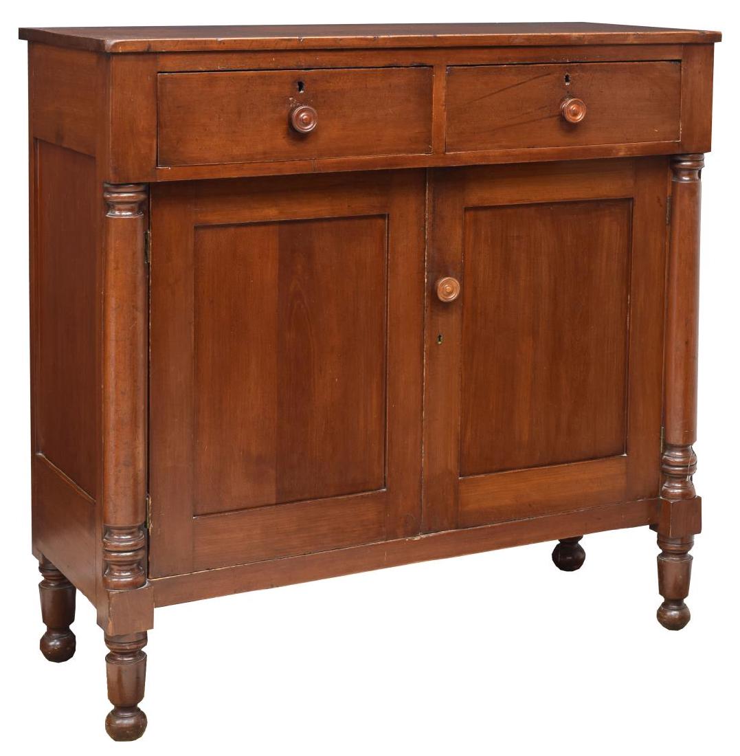 AMERICAN WALNUT CARVED SIDEBOARD, 19TH C.: American walnut sideboard, 19th c., fitted with two drawers and two-door cabinet with shelves to interior, rising on bun foot turned legs, approx 46.75"h, 46.75"w, 20"d Start Price: $100.00