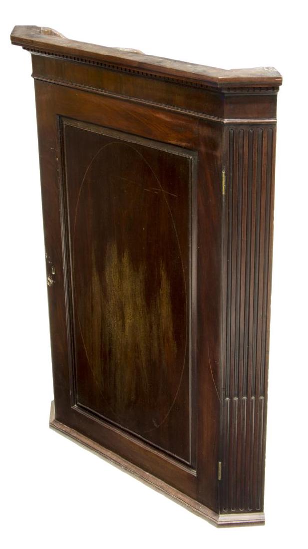 GEORGIAN MAHOGANY HANGING CUPBOARD: Georgian period mahogany hanging cupboard, c. 1780, a stepped cornice over the single pilaster flanked door opening to four shelves, 41.75"h, 30.5"w, 18"d Start Price: 100.00