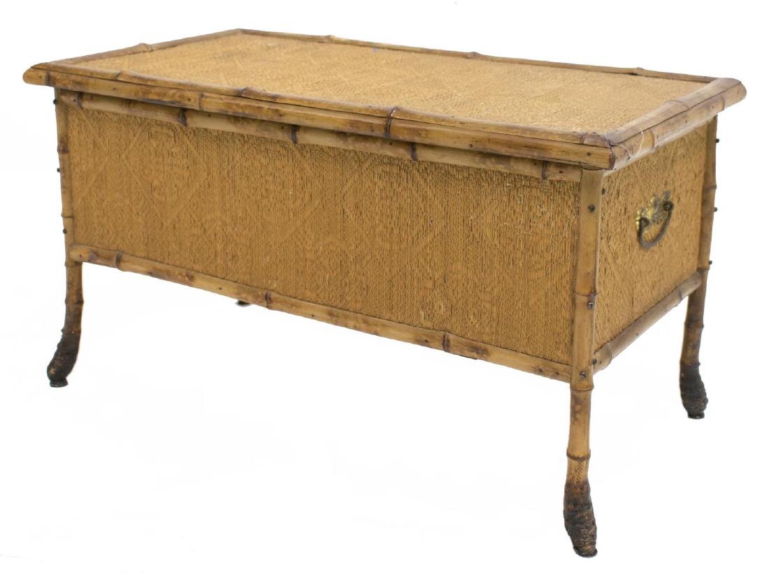 BAMBOO AND CANE BLANKET CHEST: Bamboo and woven cane chest, the hinged top opening to interior storage, handles to sides, rising on outswept legs, approx 17.5"h, 31"w, 16.75"d Start Price: $80.00