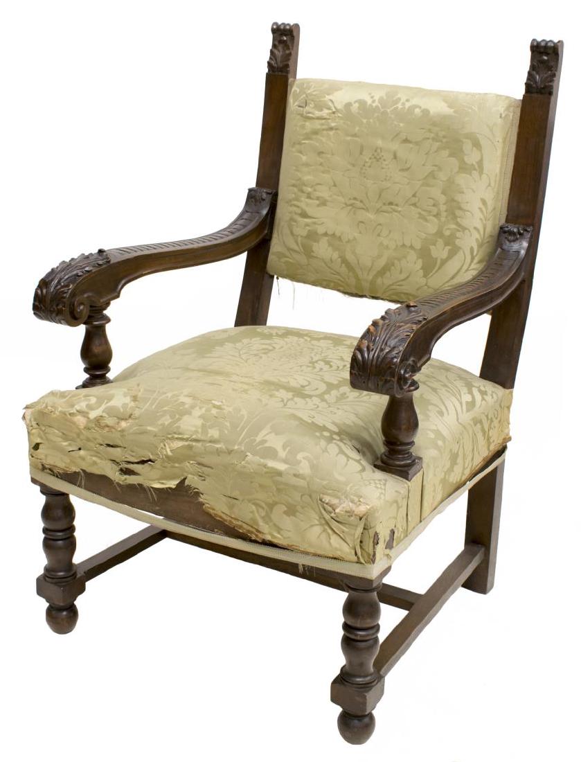 ITALIAN RENAISSANCE REVIVAL CARVED ARMCHAIR: Italian Renaissance Revival heavily carved armchair, 19th c., having scroll and acanthus carved finials, over curved arms, with acanthus and stacked coin molding, scrolled hand rests, having light gre