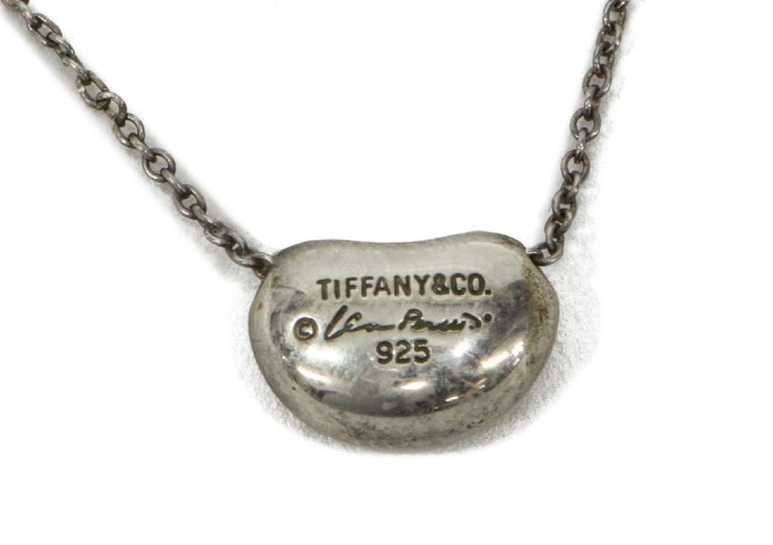 TIFFANY & CO ELSA PERETTI 925 SILVER BEAN NECKLACE: Ladies Tiffany & Co necklace, design by Elsa Peretti, sterling silver chain, centering small bean pendant, marked 925, measurements for shipping purposes only - approx 16.75"l, *Provenance: Luxury goo