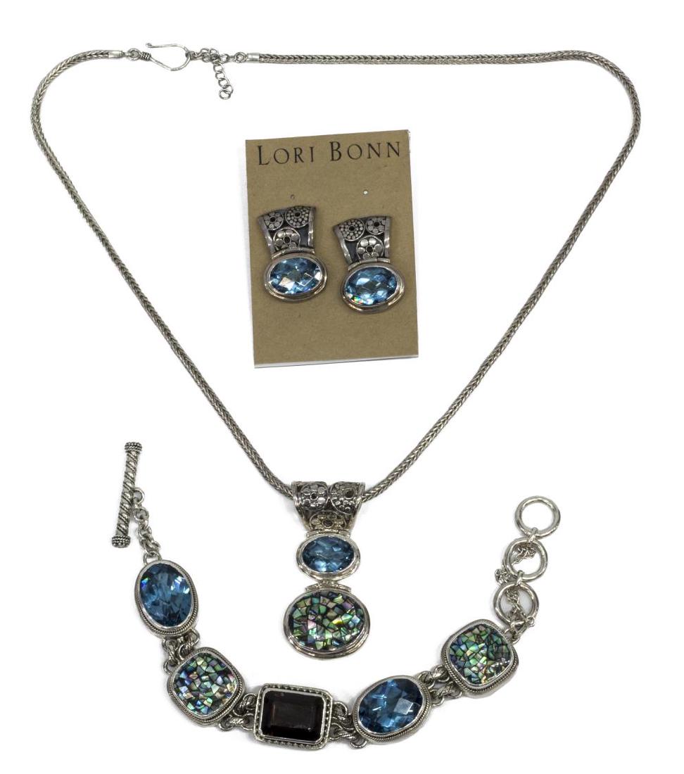 (4) CONTEMPORARY LORI BONN STERLING JEWELRY SET: (lot of 4) Contemporary Lori Bonn sterling-silver jewelry set, all pieces signed and marked 925, including: (pair) clip-on earrings, set with blue faceted glass, approx 1.25"l, (1) bracelet, set with 