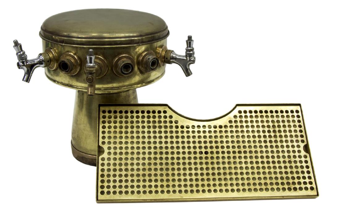 BRASS SIX PLACE BEER TAP: Brass beer tap, circular form with three faucets and three more connectors for additional three faucets, together with brass grated drain, tap lacking handles, 14"h, 15"w, 13"d, 26.5lbs Start Price: $