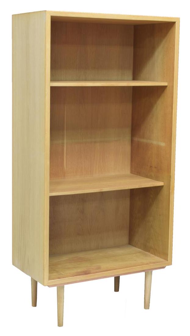 KARL ANDERSSON & SONER SWEDISH MODERN BOOKSHELF: Swedish modern bookshelf or hi-fi shelf, c. 1950s, manufactured by Karl Andersson & Soner, design attributed to Borge Mogensen (Denmark, 1914-1972), rectangular case fitted with shelves, rising on tap