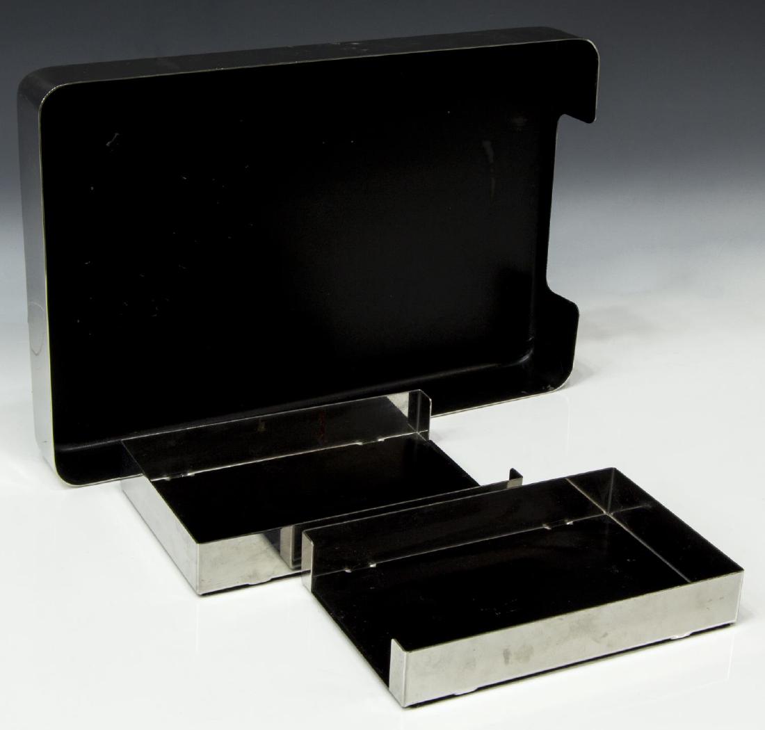 (3) MID-CENTURY 'RADIUS ONE' DESK ACCESSORIES: (lot of 3) Mid-century modern "Radius One" desk accessories, designed by William Sklaroff for McDonald Products, mirrored stainless steel, including: (1) single letter tray, 2.25"h, 15.5"w, 10.25"d, (