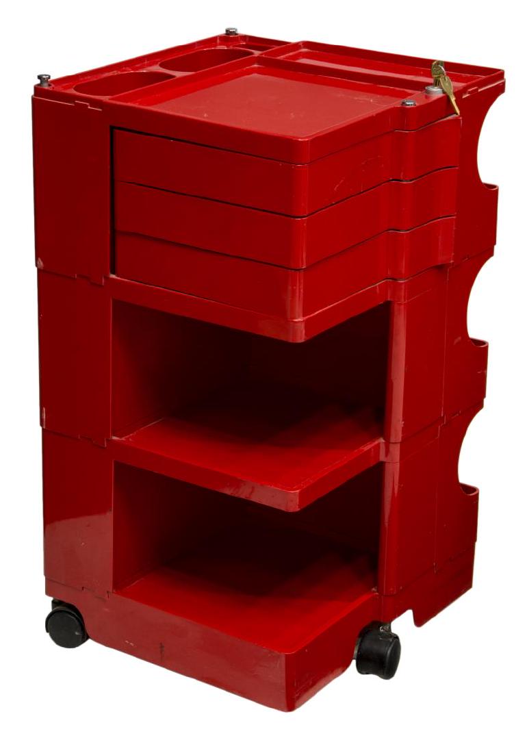 ITALIAN MID-CENTURY 'BOBY' STORAGE SYSTEM, COLOMBO: Italian mid-century modern "Boby Cart," mid 20th c., designed by Joe Colombo (Joseph Cesare Colombo, Italy, 1930-1971), red plastic with swing out trays, shelves, and bins, on caster feet, approx 29.2