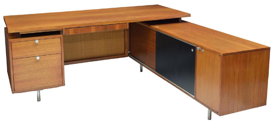 GEORGE NELSON HERMAN MILLER EXECUTIVE DESK: Mid-century modern L-shaped floating executive desk, designed by George Nelson (United States, 1908-1986) for Herman Miller, tiered tops fitted with drawers, cabinets, and a small pull-out writing sur