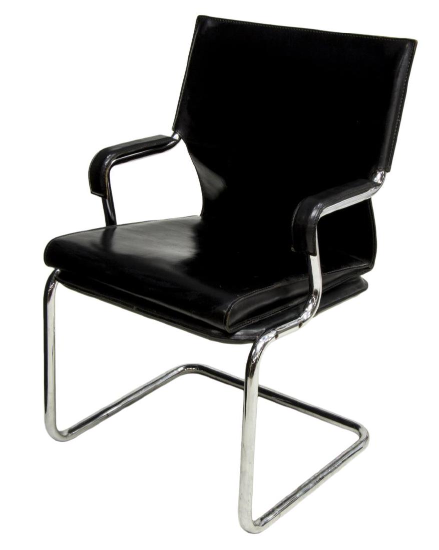 MID-CENTURY MODERN CANTILEVER LEATHER ARMCHAIR: Knoll, Archizoom Associatti mid-century modern armchair, with black leather upholstery, on a tubular chromed steel cantilever frame, approx 32.75"h, 22.75"w, 21"d Start Price: $80.00