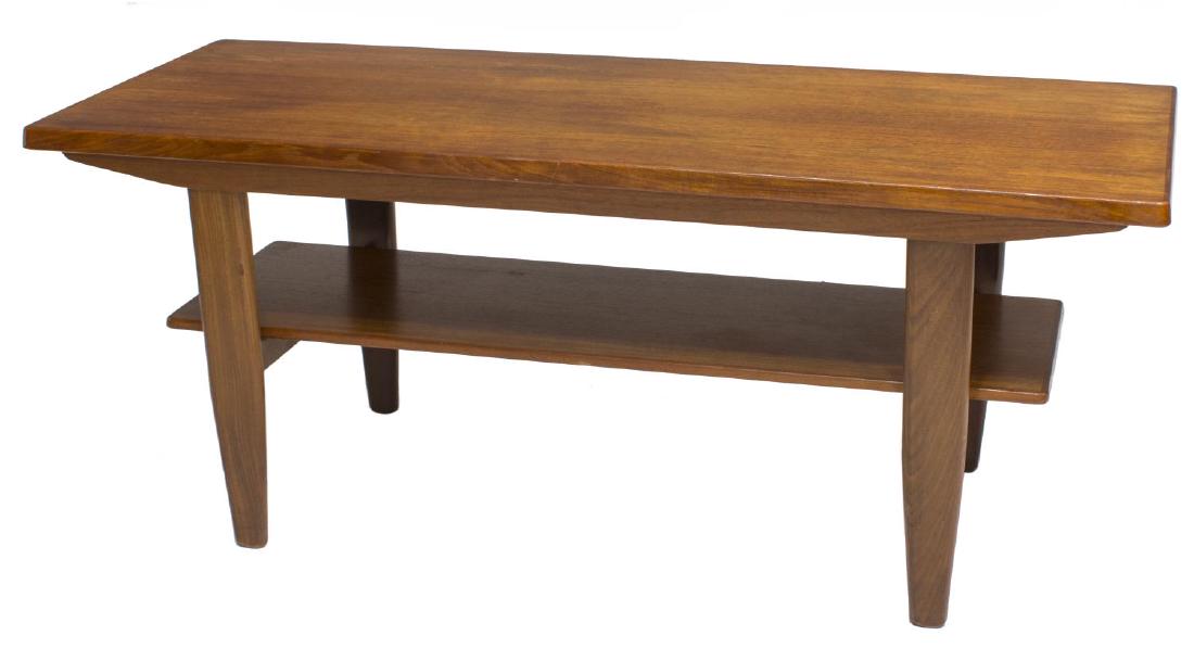 DANSIH MID-CENTURY MODERN TEAKWOOD COFFEE TABLE: Danish mid-century modern teakwood coffee table, c. 1950's, rectangular top, rising on square tapered legs, joined by lower shelf, approx 21"h, 51"w, 20.5"d Start Price: $150.00