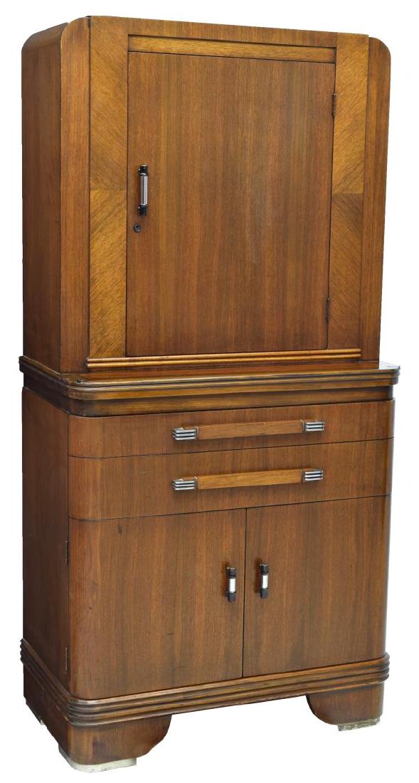 DONALD DESKEY FOR HAMILTON DENTAL/ MEDICAL CABINET: American Art Deco dental/ medical cabinet, c. 1930s, designed by Donald Deskey (United States, 1894-1989) for Hamilton MFG Co., top cabinet fitted with single hinged door, opening to a light over two 
