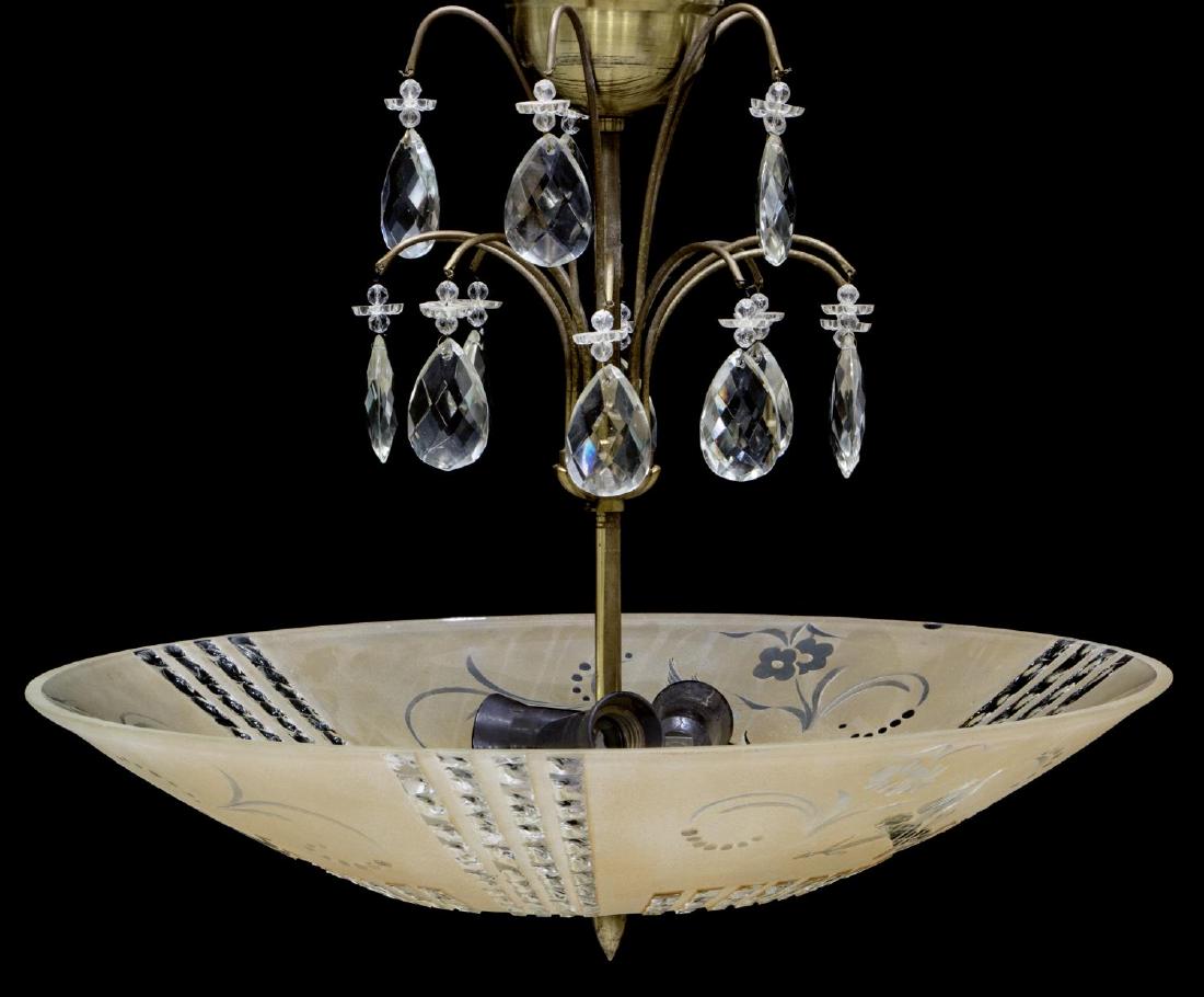 ART DECO BRASS & ETCHED GLASS PENDANT LIGHT: Art Deco pendant light, Sweden, c. 1940, having brass rod, supporting two tiers, top with faceted tear drop crystals, over pale yellow glass bowl shade, with sand and acid etched cupids and floral mot
