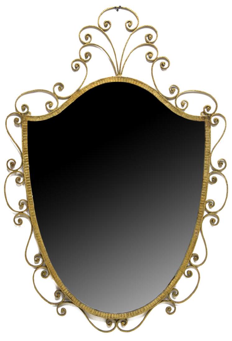 PIER LUIGI COLLI ITALIAN GILT IRON MIRROR: Italian gilt iron mirror, design by Pier Luigi Colli (Italian, 1895-1968), c. 1950's, pierced scrolled frame, holding shield shaped flat plate mirror, approx 44"h, 30.5"w, 1"d, 24lbs Start Price: 100.