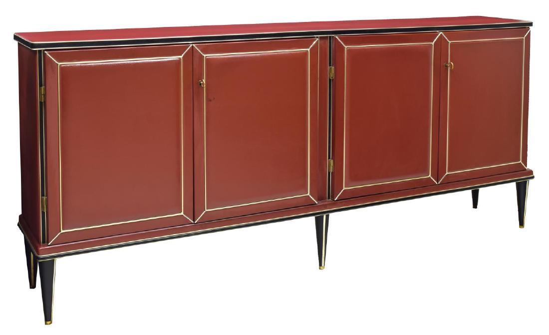 ITALIAN MID-CENTURY MASCAGNI BOLOGNA SIDEBOARD: Italian mid-century modern sideboard, c. 1950s, design by Umberto Mascagni (Bologna, 20th c.), long rectangular case wrapped in red vinyl with black faux snake skin and gilt metal trim, fitted with tw