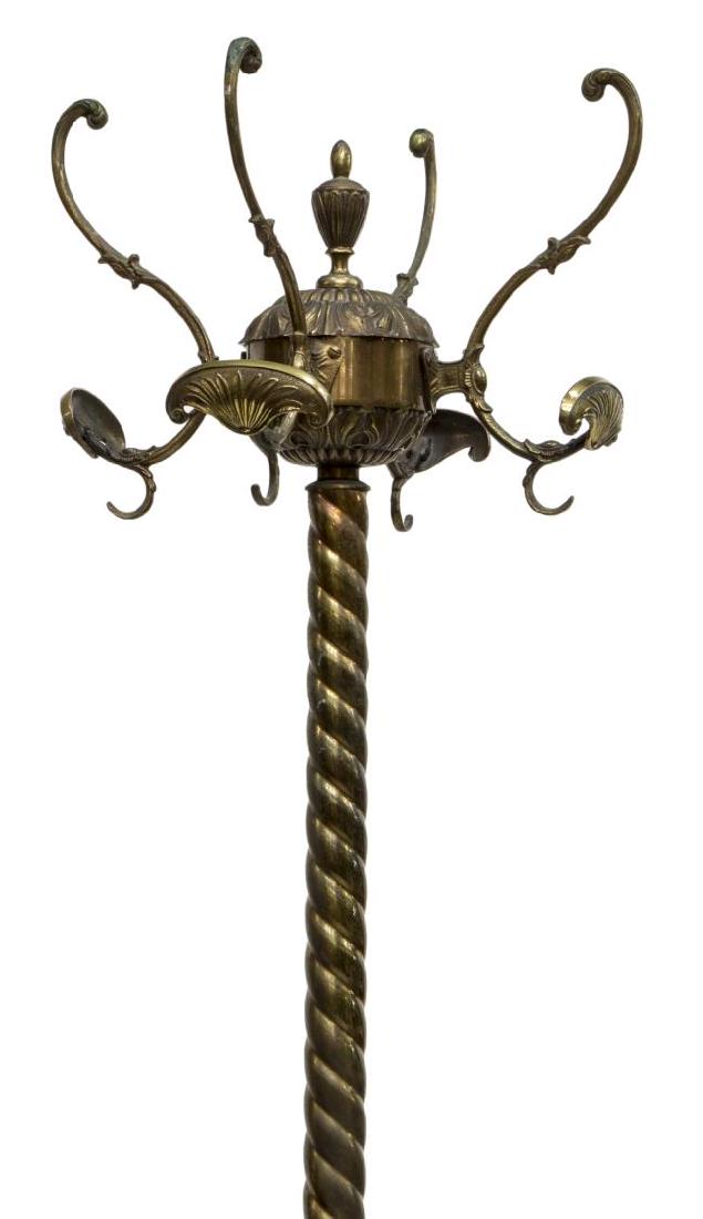 GILT BRASS HALL TREE WITH HAT & COAT HOOKS: Gilt brass hall tree, the urn finial issuing four scrolling arms ending in hat and coat hooks, the spiral standard rising on scroll foot spider legs, approx 68"h, 22.25"w, 22.25"d Start Price: $100.00