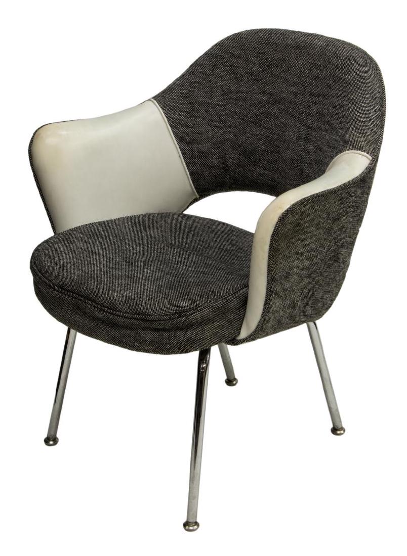 EERO SAARINEN FOR KNOLL EXECUTIVE ARMCHAIR: Saarinen Executive Armchairs, designed by Eero Saarinen (Finland, United States, 1910-1961) for Knoll, in grey upholstery with white vinyl accents, rising on chromed steel legs, with glider feet, unma