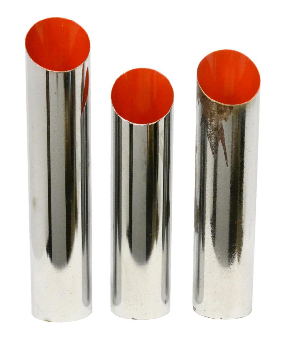 (3) ITALIAN MODERN CHROMED STEEL UMBRELLA STANDS: (lot of 3) Italian mid-century modern umbrella stands, c.1970, each having cylindrical chromed steel bodies, angled tops, painted orange interiors, varied heights, each having loss to exterior chrome 